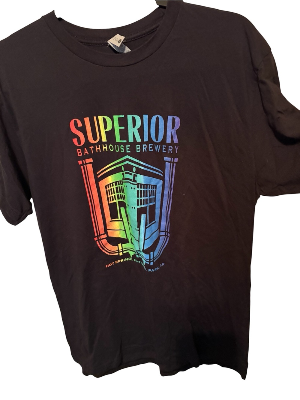 next Black Tee with Rainbow "Superior Bathhouse Brewery" Graphic